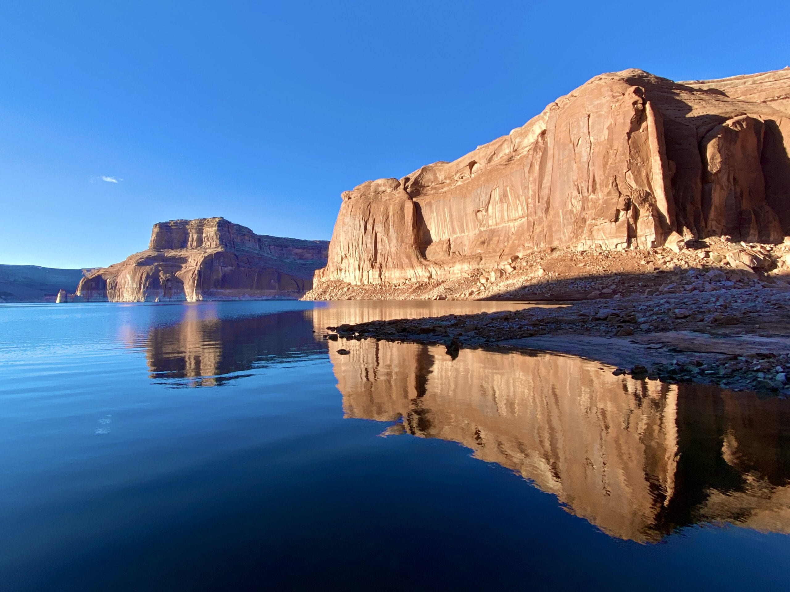 Reflections on Lake Powell traveling from Arizona to Utah by Houseboat