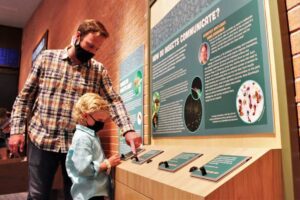 Image of father and child at Flandrau planetarium