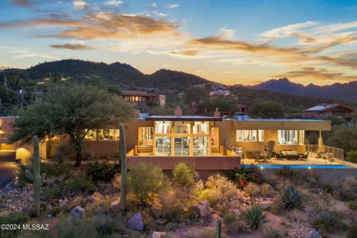 Front exterior view of 4960 W Monte Carlo Drive, a Frank Lloyd Wright-inspired home in Tucson, Arizona, sold quickly due to its unique design and marketing strategy.