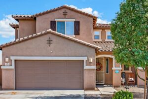 Two-story stucco home with a tile roof in Sahuarita, Arizona