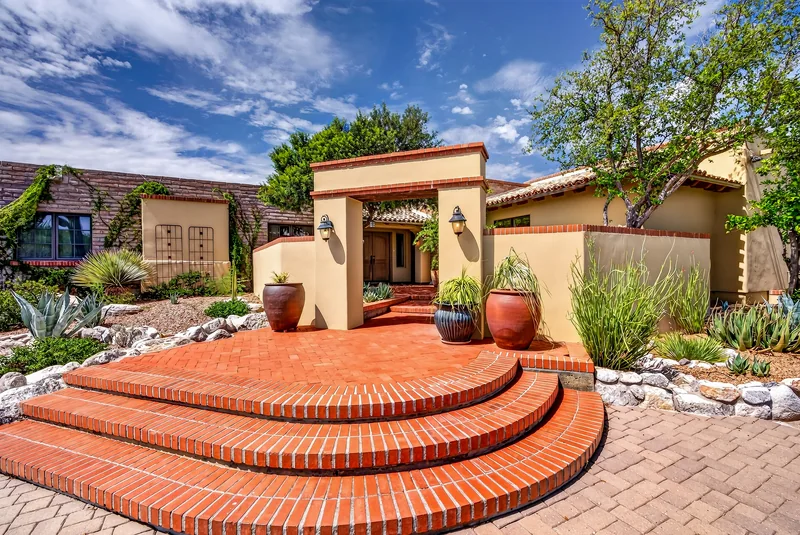 Private courtyard entry with brick details in a Catalina Foothills home for sale