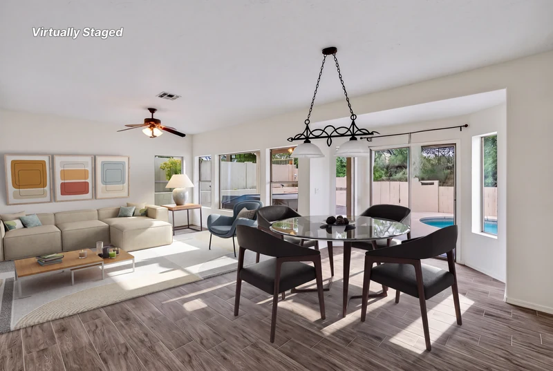 Modern open-concept living room and kitchen in a move-in ready Tucson home
